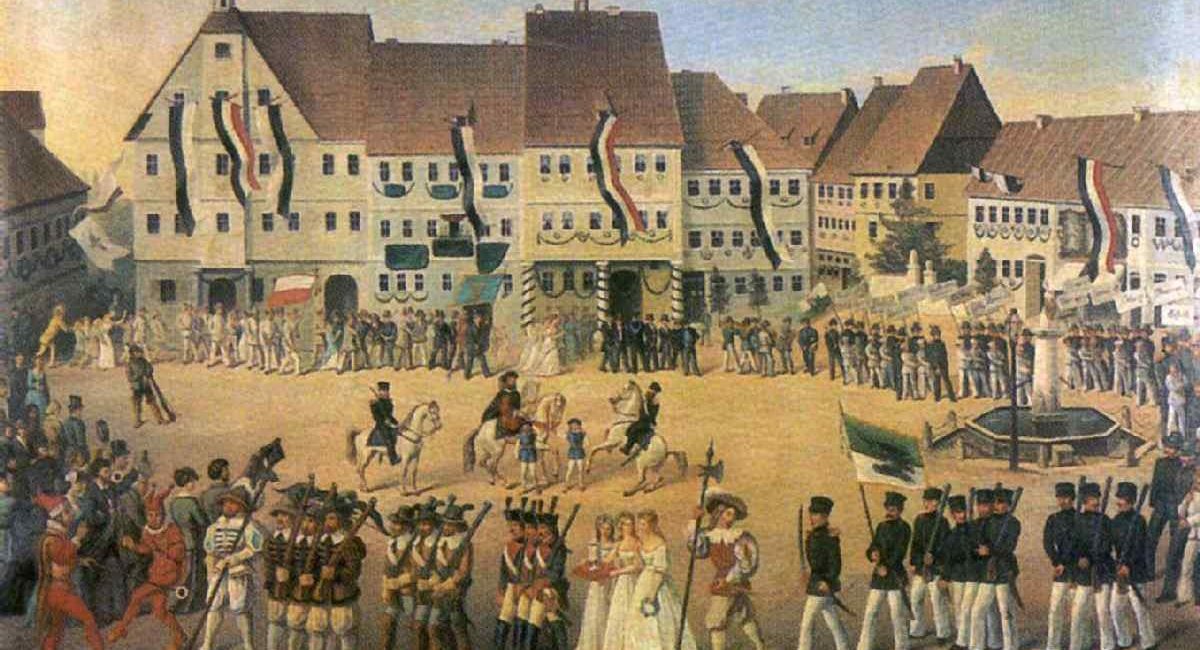 <a href="https://commons.wikimedia.org/wiki/File:Johann_Ulrich_St%C3%A4helin_-_Schleusinger_Marktplatz_mit_Festumzug_zum_Sch%C3%BCtzenfest_1874.jpg">Johann Ulrich Stähelin (1802-after 1874)</a>, Public domain, via Wikimedia Commons